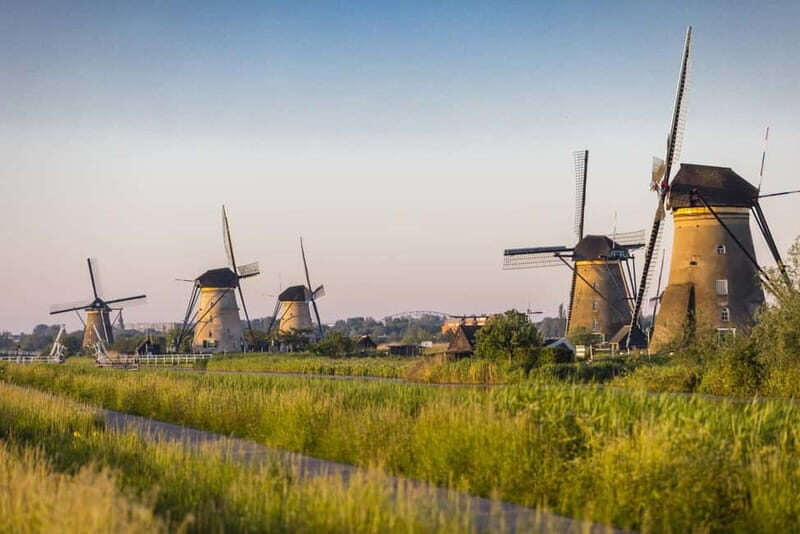 Amsterdam: Kinderdijk, Euromast, Delft and Den Haag Day Tour - Comfort, food, and realistic expectations for a day tour