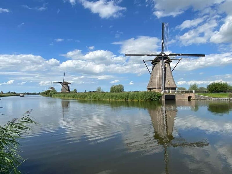 Amsterdam: Kinderdijk, Euromast, Delft and Den Haag Day Tour - Kinderdijk UNESCO windmills: seeing 19 original mills in one view