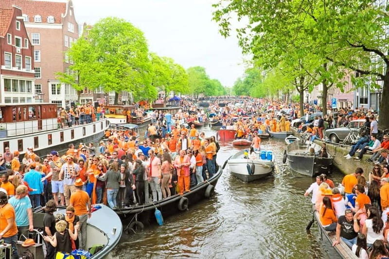 Amsterdam: Kings Day Boat Party with Unlimited Drinks - Weather and the open vs covered boat option