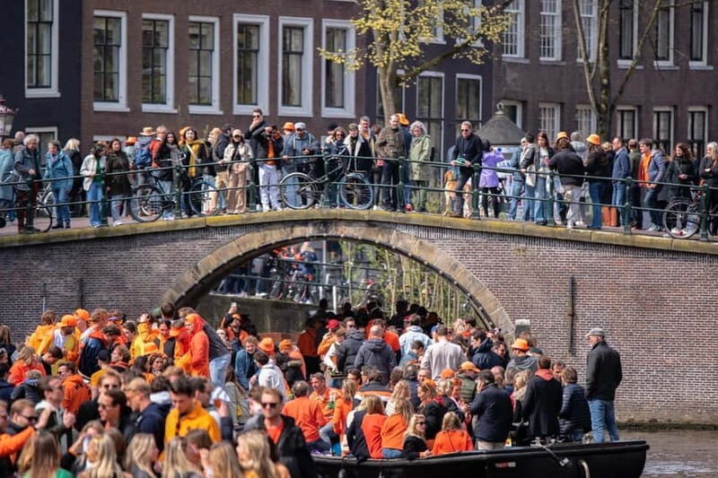 Amsterdam: Kings Day Boat Party with Unlimited Drinks - Finding Eco Boats at Amsterdam Central Station (Stationsplein 40)