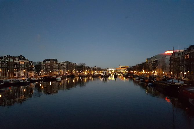 Amsterdam Layover: Airport Transit City Tour - Maritime Museum district and Waterlooplein: canals, markets, and architectural hits