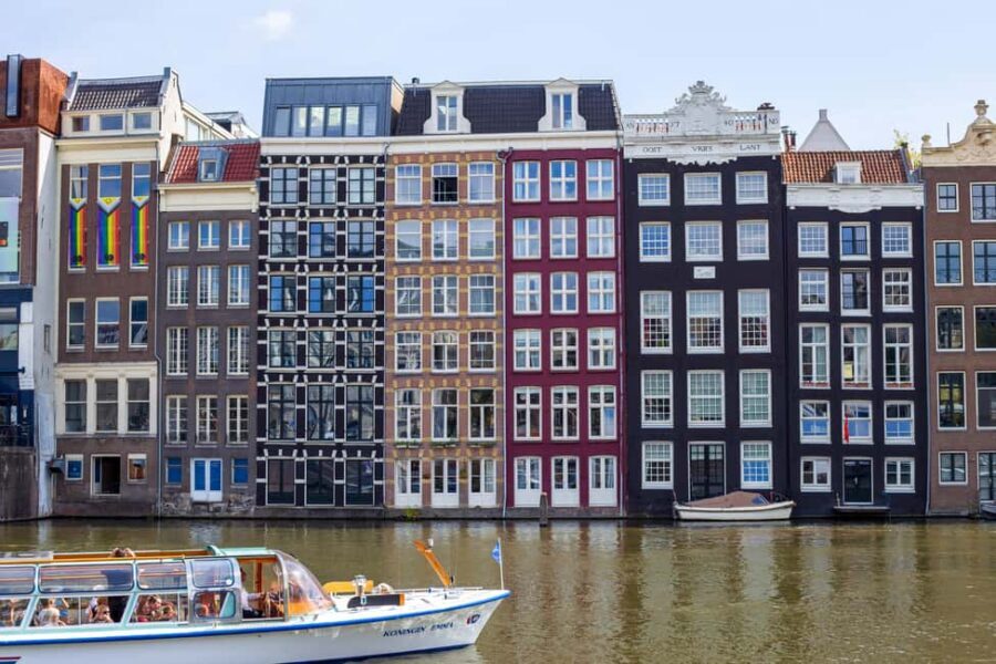 Amsterdam Legends & History Walking Tour with Local Guide - Torensluis Bridge and the Westerkerk area: names, symbols, and the stories behind them
