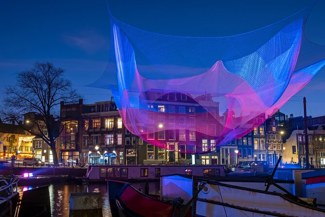 Amsterdam Light Festival Canal Cruise + Unlimited Drinks Option - Lights and photo moments: slowing down for the good views