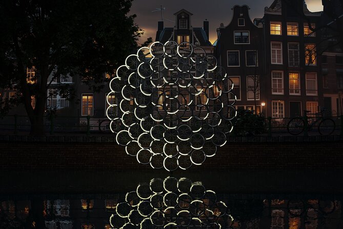 Amsterdam: Light Festival Open Boat - Unl. Drinks Option - Maritime Stories Inside a Former Navy Storage Facility