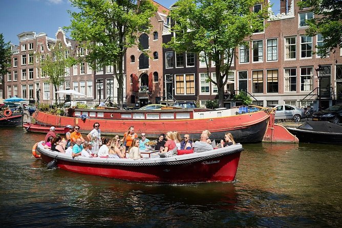Amsterdam Light Festival: Saloon Boat Cruise + Hot Drinks & Bite - Why this Amsterdam Light Festival cruise feels different on the water