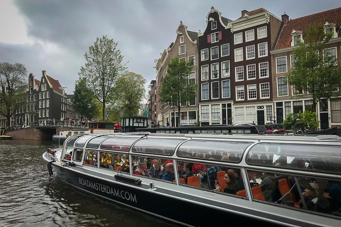 Amsterdam Live Guided Sightseeing Canal Cruise - Cruising the UNESCO Canal Belt: Amstel River, Herengracht, and Prinsengracht