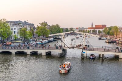 Amsterdam Luxury Canal Cruise + Unlimited Drinks & Bites option - Westerkerk and Carré: Churches and Theaters in the Same Breath