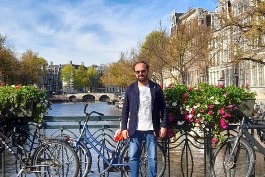 Amsterdam: Must-See Attractions Guided Walking Tour - Passing the Red Light District: what your guide can help you make sense of