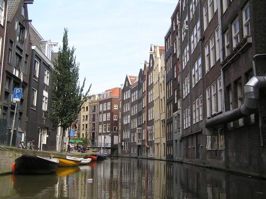 Amsterdam Old City Private Walking Tour - Old Church and Oude Manshuispoort: historic details that change your eye