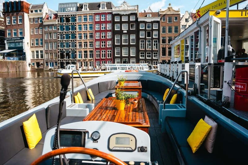 Amsterdam: Open Boat Canal Cruise (with Free Spritz Option) - The skipper and live guide stories: Your ride becomes a moving mini-lesson