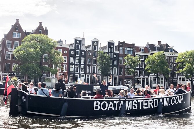 Amsterdam Open Boat Cruise in Old City Centre with Drinks Options - Getting on board at Amstel 51F (and why timing matters)