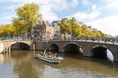 Amsterdam Open Boat Tour with Local Guide - Price and Value vs Walking or a Bigger Boat