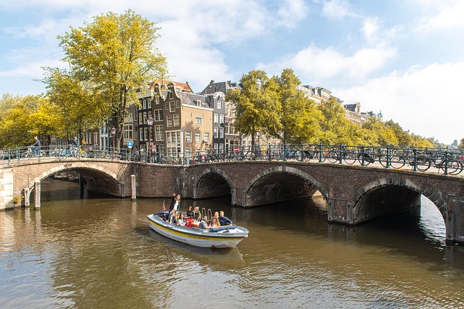 Amsterdam Open Boat Tour with Local Guide - Price and Value vs Walking or a Bigger Boat