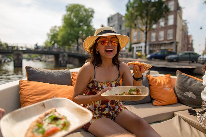Amsterdam Private Boat Trip with Pizza and Unlimited Drinks - Canal views that feel personal, not packaged