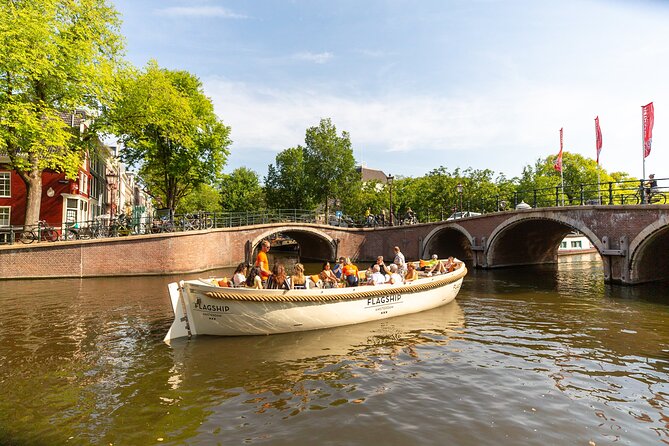 Amsterdam Private Boat Trip with Pizza and Unlimited Drinks - Anne Frank-area landmarks and the classic art pause