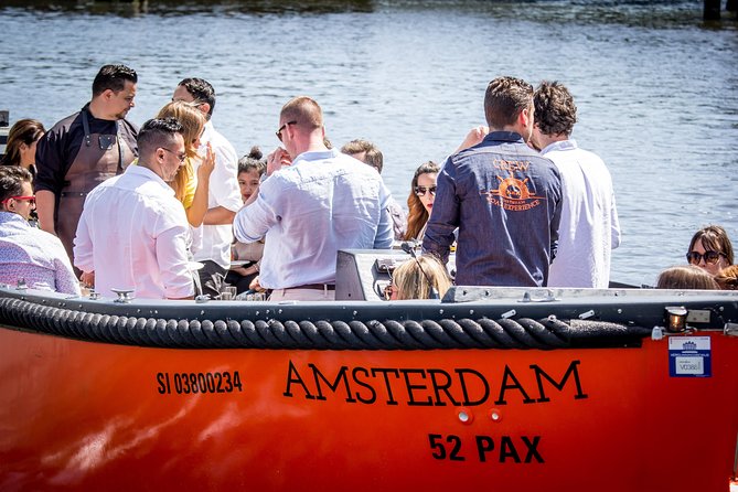 Amsterdam Private Boat Trip With Skipper, Burger and Beers - From the water: Rijksmuseum, Anne Frank House, and the Red Light District