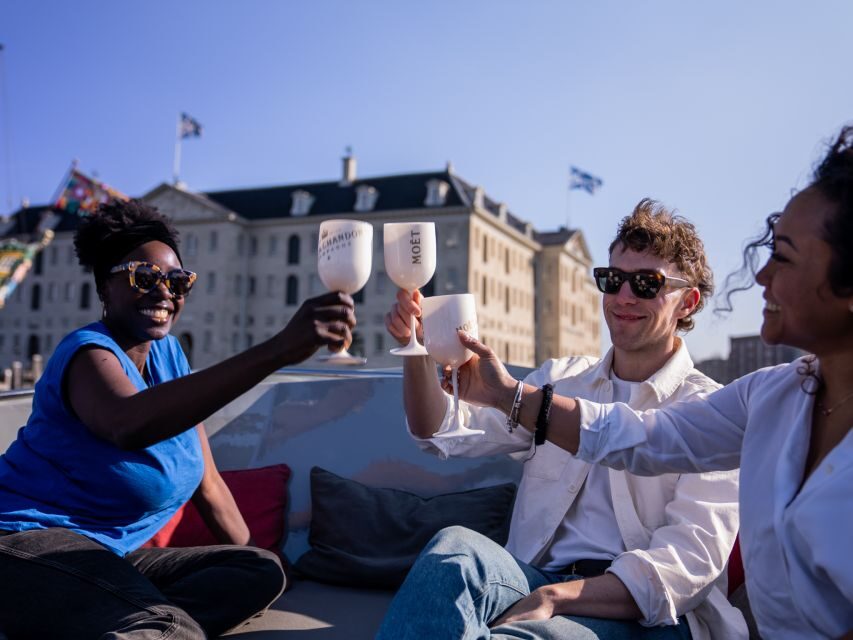 Amsterdam: Private Canal Cruise with Drinks and Snacks - On-Board Comfort: Cozy Boat, Roof for Rain, and the Skipper’s Role