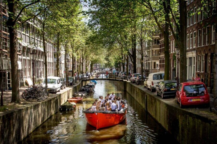 Amsterdam: Private Cruise with Drinks & Optional Snacks - Weather, open-boat comfort, and the no-swim rule