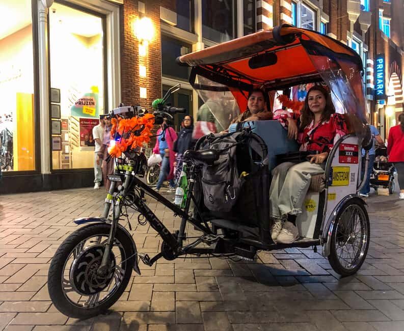 Amsterdam: Private Guided Pedicab & Rickshaw Highlights Tour - Red Light District and the Flower Market: lively sights with smart guidance