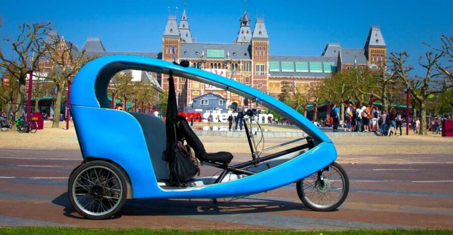 Amsterdam: Private Pedicab Historical Sightseeing Tour - Dam Square to Royal landmarks: the city’s starting point on a pedicab