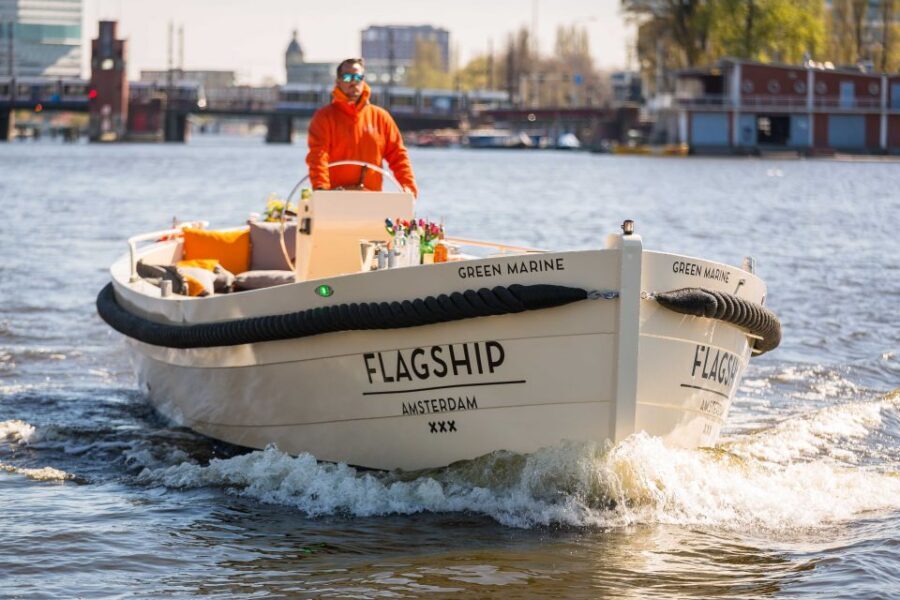 Amsterdam: Private Prosecco Canal Cruise Tour - Private Prosecco on a silent boat: what the onboard vibe feels like