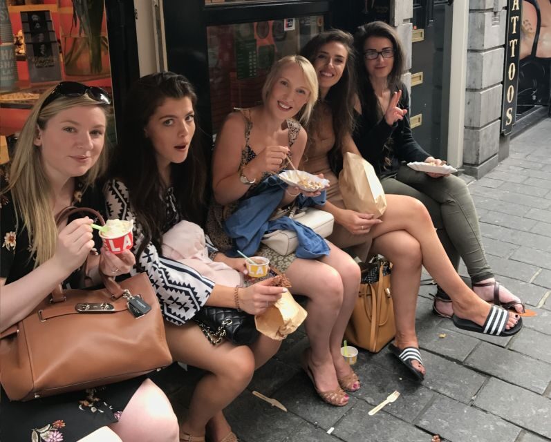 Amsterdam: Private Red Light District and Food Tour - Chinatown vibes, the narrowest house, and the point of side streets