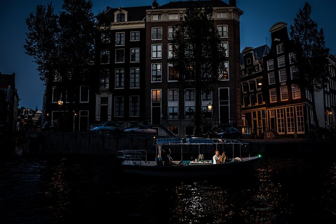 Amsterdam: Private Romantic Evening Canal Cruise + Bubbles/Snacks - The Skinny Bridge and its hundreds of lights