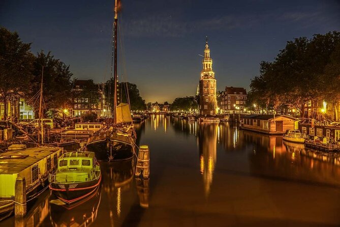 Amsterdam: Private Romantic Evening Canal Cruise + Bubbles/Snacks - Amsterdam after dark: quiet canals, lit buildings, and that slow pace