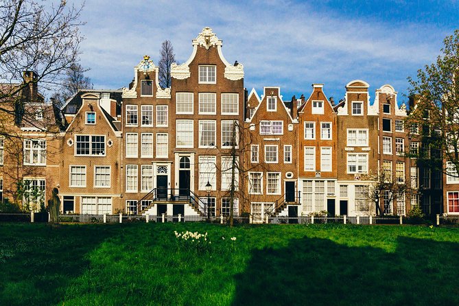 Amsterdam Private Tour: Highlights & Hidden Gems by Bike or Foot - Rembrandtplein: from old market ground to a hangout square
