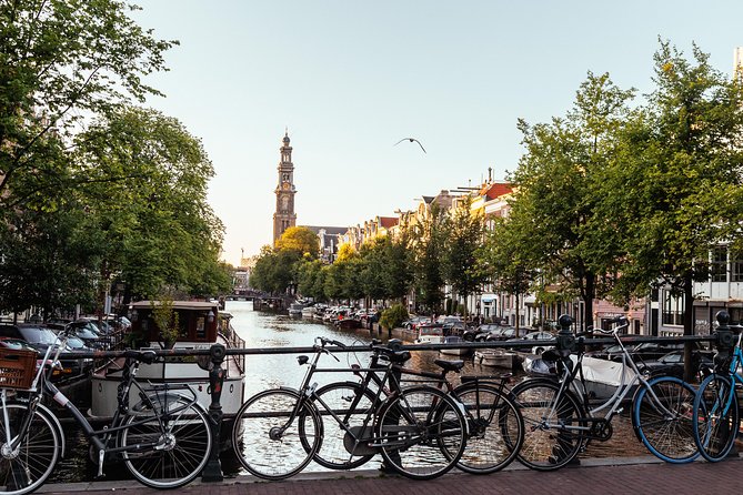 Amsterdam Private Tour: Highlights & Hidden Gems by Bike or Foot - Begijnhof chapel and medieval quiet: where the city slows down