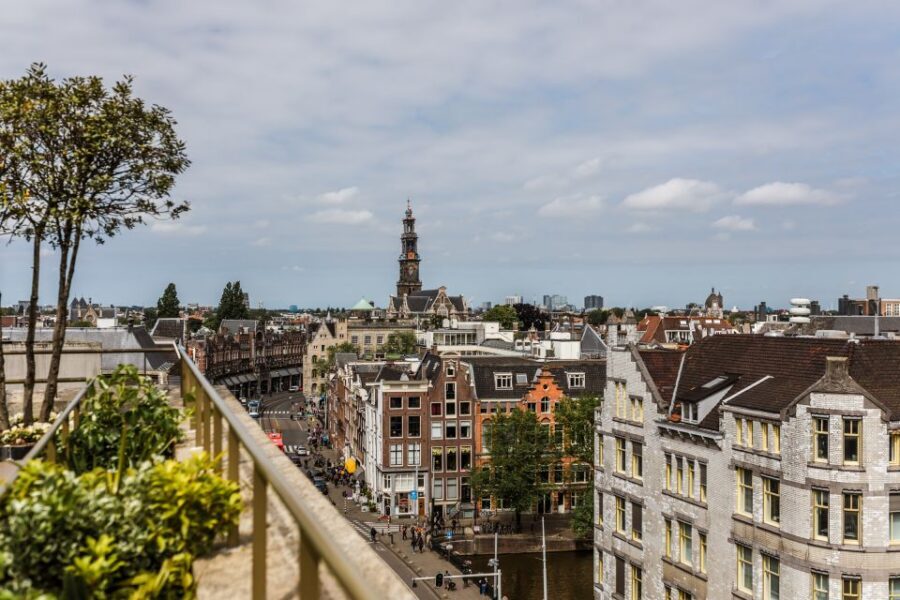 Amsterdam: Private Walking Tour of Jordaan & De 9 Straatjes - Westerkerk edge: landmark time at the Jordaan perimeter