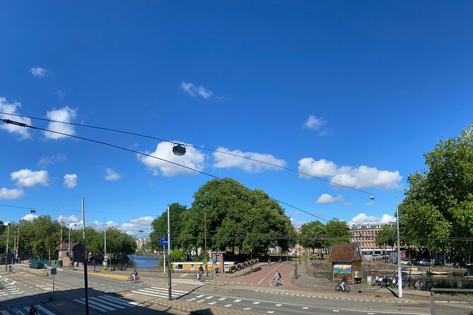 Amsterdam Private Walking Tour with Dinner Experience - The dinner setup: what you can expect to eat and how wine fits in