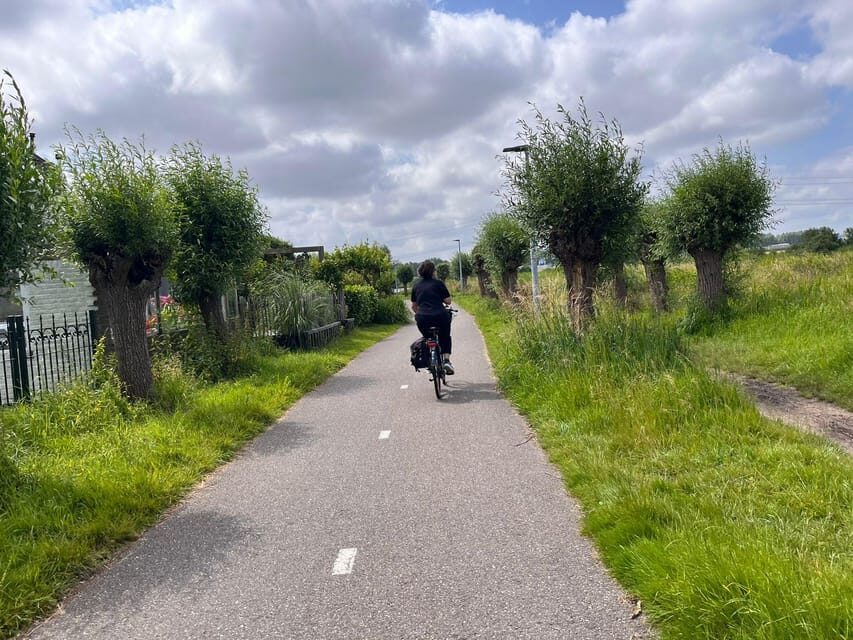 Amsterdam: Rainbow Rural Bike Tour With Local Gay Guide - Cows, sheep, and the small rural touches that make it feel Dutch
