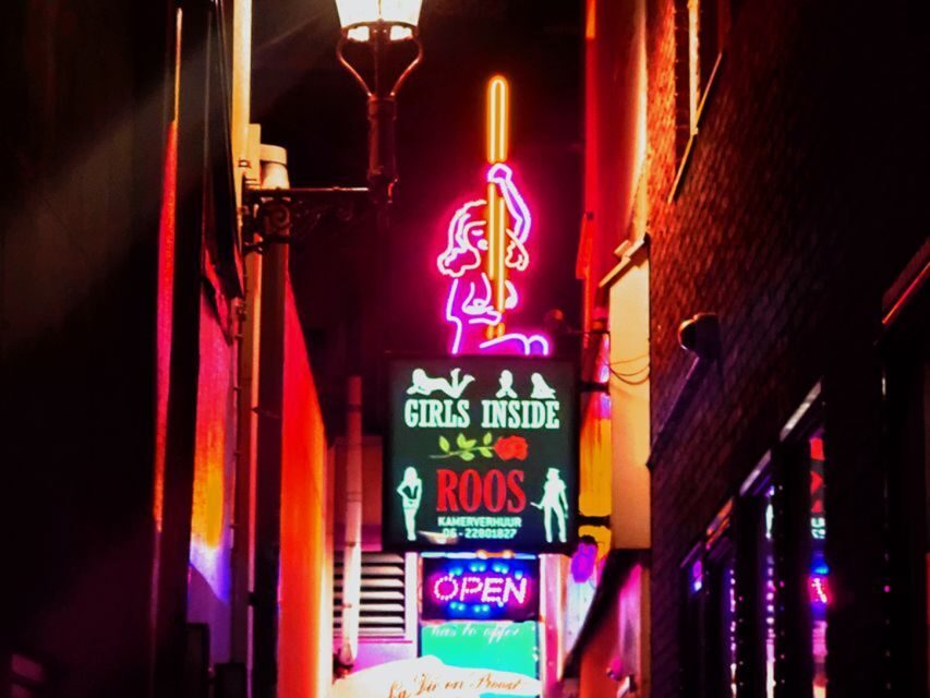 Amsterdam: Red Light District and Coffeeshop Culture Tour - Red Windows and the Narrow-Street Effect