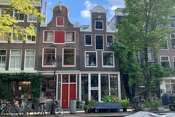 Amsterdam: Red Light District & City Tour (Private tour) - Nieuwmarkt and De Waag: ending with history and an optional 70s peep show