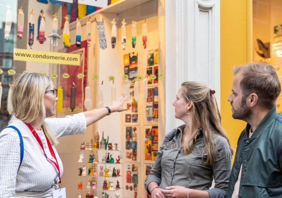Amsterdam: Red Light Tour Exclusive + Peep Show - Condomerie and Oude Kerk: where old Amsterdam meets modern debate