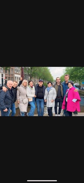 Amsterdam: Red Light Tour with Bar Visit + Free Drink and Stop at a Coffee Shop - Key things to know before you go