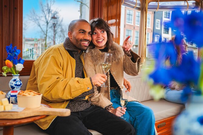 Amsterdam: Romantic Canal Cruise with Optional Bubbles & Bites - Leidseplein and the Rijksmuseum view: culture you can spot fast
