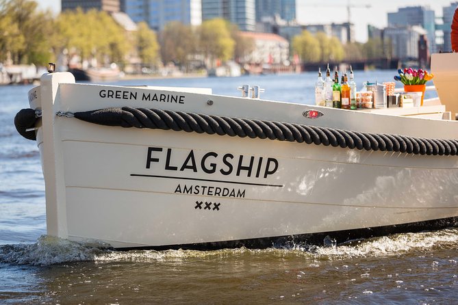 Amsterdam: Saloon Boat Cruise + Unlimited Drinks & Bite option - The Drunken Houses and why canal curves make rare views possible