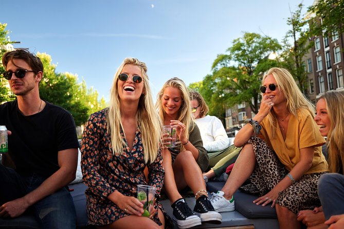 Amsterdam: Saloon Boat Cruise + Unlimited Drinks & Bite option - Weather reality: bring warm layers, expect damp conditions