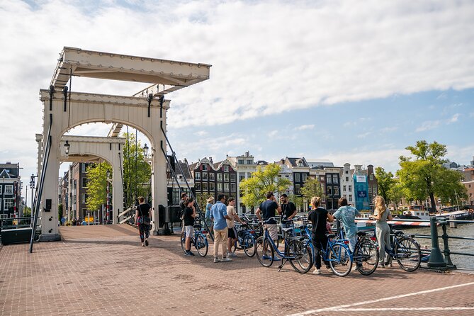 Amsterdam Small-Group Bike Tour With Optional Canal Cruise - Meeting Point at Nieuwezijds Voorburgwal: Close to the action