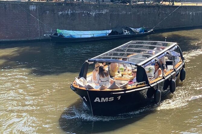 Amsterdam Small-Group Canal Cruise Including Snacks and Drinks - Why an Open Electric Sloop Makes Amsterdam Look Different