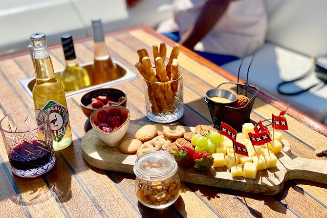 Amsterdam Small-Group Canal Cruise Including Snacks and Drinks - The Captain Makes It: Stories From Erik, Stephen, Phillipe, and More