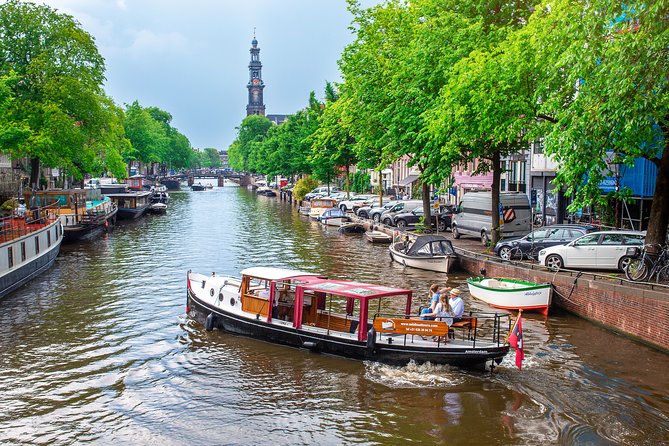 Amsterdam Small-Group Canal Cruise With Dutch Snacks and Drink - Dutch snacks and drinks on board: more than a token tasting