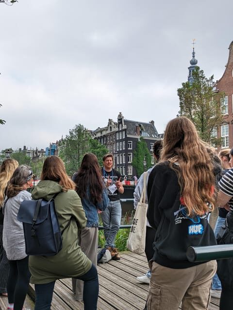 Amsterdam: small group tour: History, humor & hidden gems - Meet at Those Dam Boat Guys, then follow the canal-belt thread