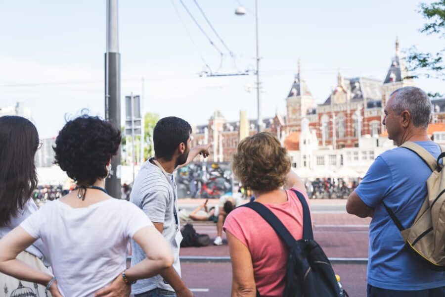 Amsterdam Small-Group Walking Tour with Canal Cruise - Getting started at Beursplein: your first win is the location