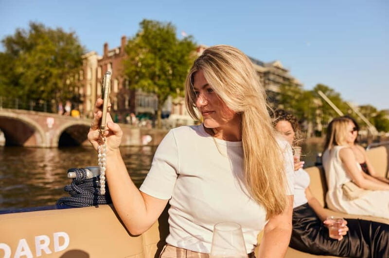 Amsterdam: Spanish Guided Open Boat Cruise with Bar Onboard - Practical tips to make your hour better
