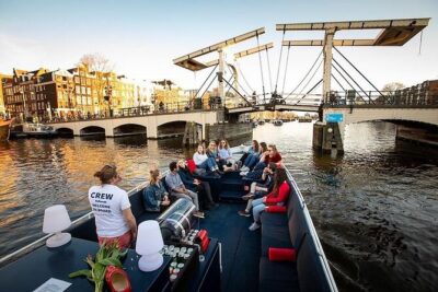 Amsterdam Sunset Canal Cruise with Live Guide and Open Bar - The One-Hour Route: From the Amstel and Canal Ring to Iconic Landmarks