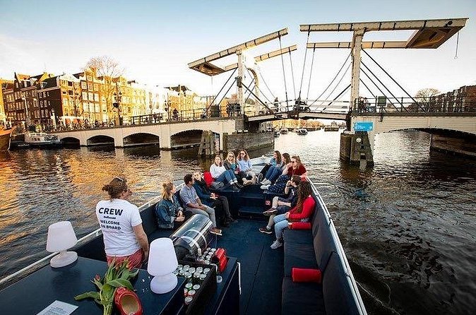 Amsterdam Sunset Canal Cruise with Live Guide and Open Bar - The Only Real Risk: Weather and the One-Hour Time Limit
