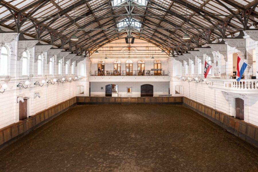 Amsterdam: The 'Hollandsche Manege' Stables Entry Ticket - Entering Through the Large Doors and Finding Your Flow